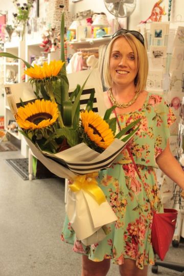 One of our lovely customers Anna-May with her Sunflower Bouquet